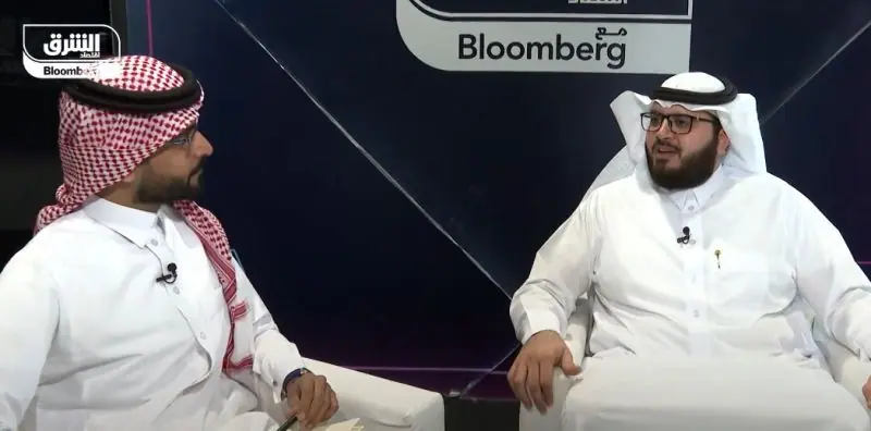 Ahmed Alshareef with an Asharq Bloomberg presenter in the conference studio