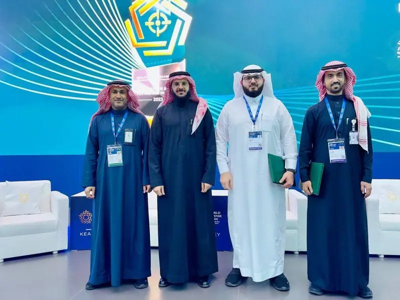 Four people on the Innovation Award for Military Industries stage